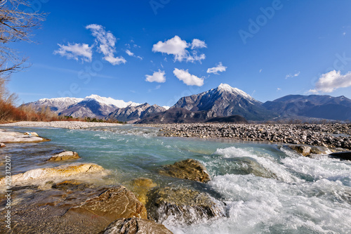 Mountain landscape with river. Italy Alps