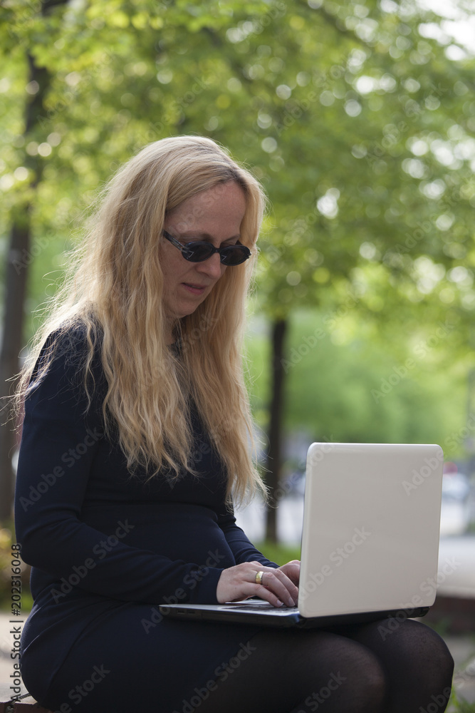 Woman typing on a computer Woman typing on a computer