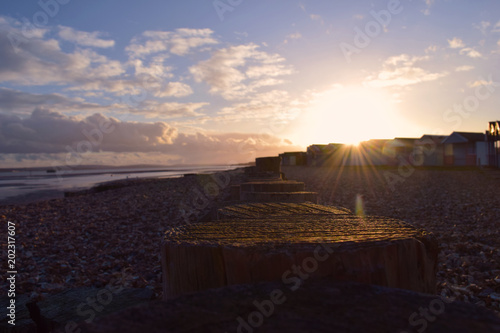 Sunset on the beach at Calshot, UK photo