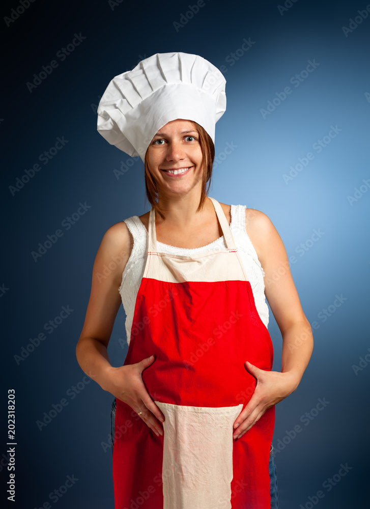 A bun in the oven. Pregnant woman cook. A bun in the oven. Pregnant woman cook.