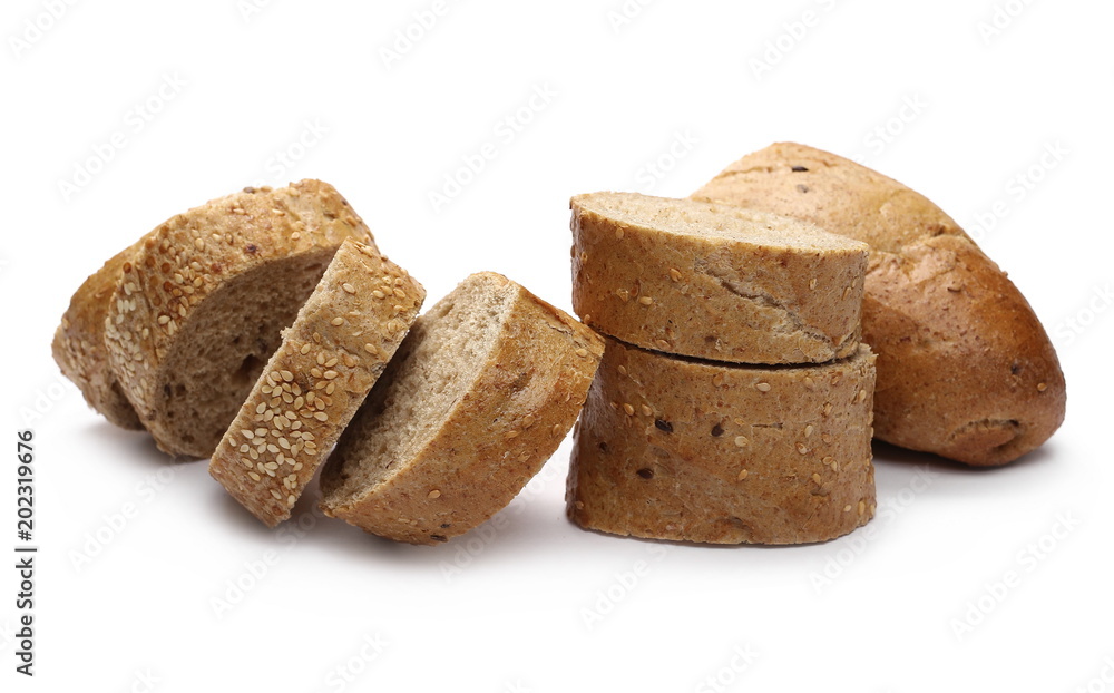 Loaf of whole wheat bread with sesame and slices isolated on white background Loaf of whole wheat bread with sesame and slices isolated on white background
