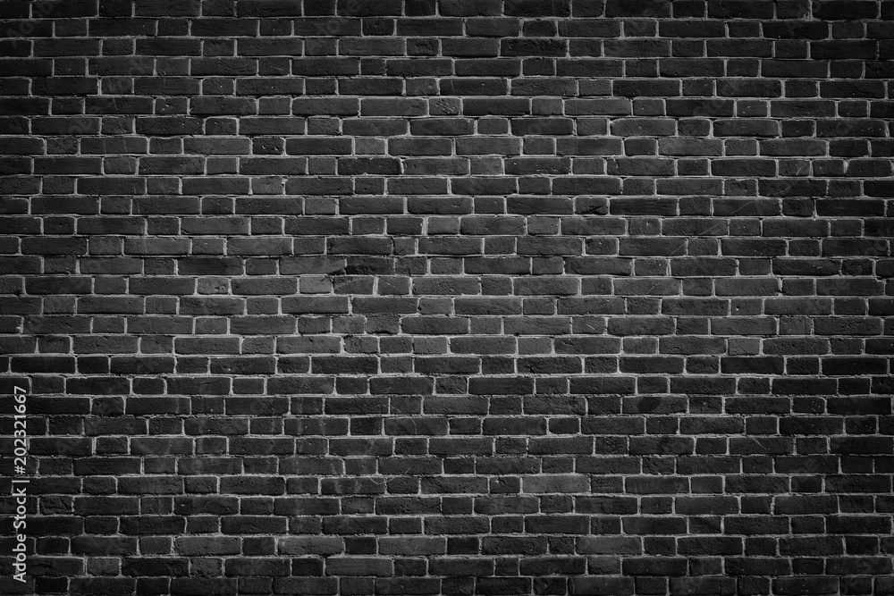Dark grey brick wall texture - urban grunge black masonry background