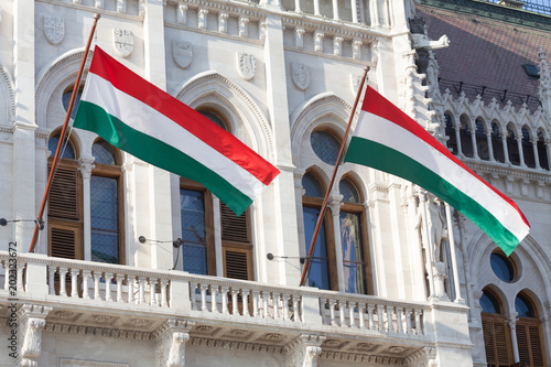 Photography hungarian national flags on the hungarian parliament building