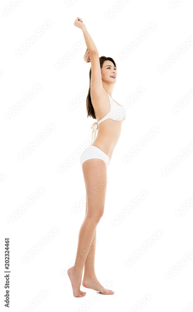 side view of happy young woman in bikini side view of happy young woman in bikini