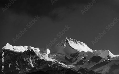 A peak in the Annapurna mountain range, Nepal. Black and white photograph.