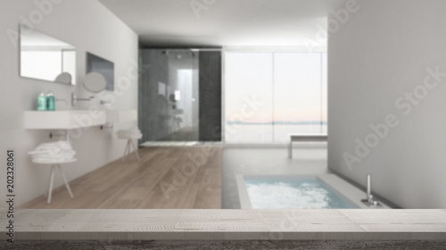 Wooden vintage table top or shelf closeup  zen mood  over blurred minimalist white bathroom with bath tub and panoramic window  white architecture interior design
