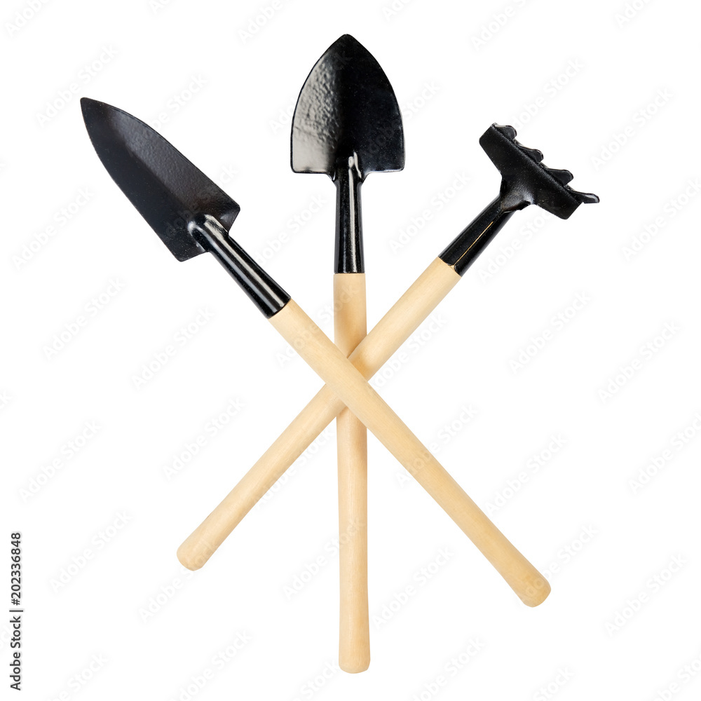 Gardening tools, shovels, rake isolated on white Gardening tools, shovels, rake isolated on white