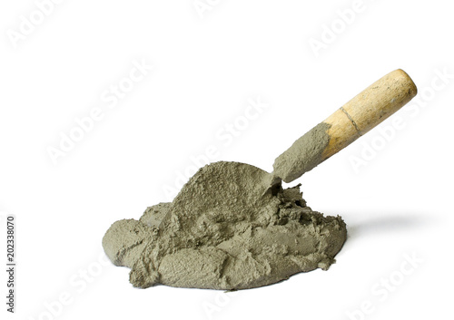 Cement or mortar with the trowel, Cement mix pile with the trowel isolated on white background with Clipping Path.