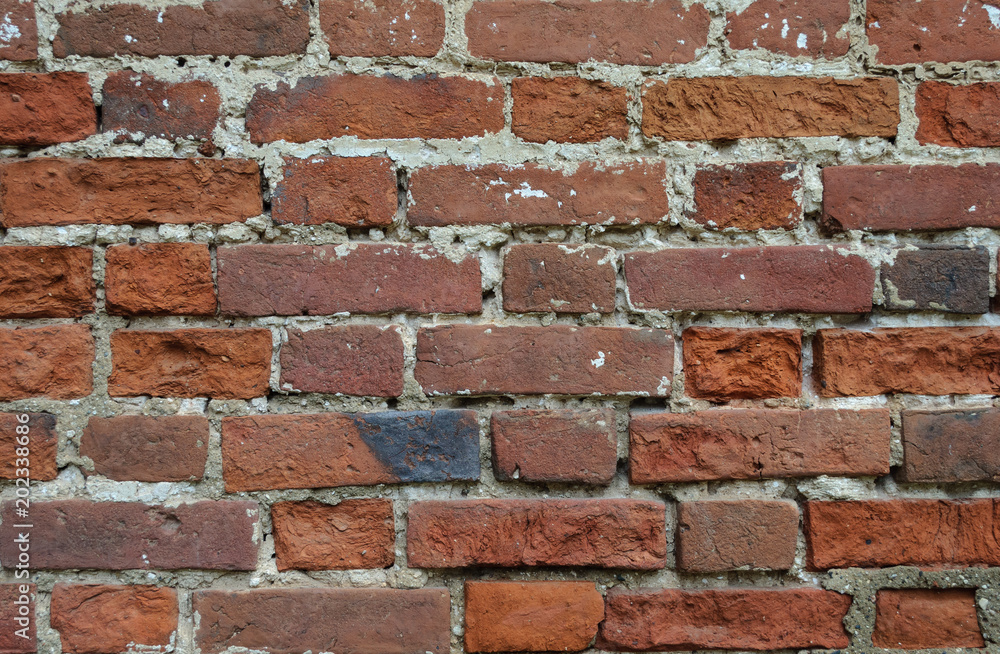 Old weathered red brick wall texture Old weathered red brick wall texture