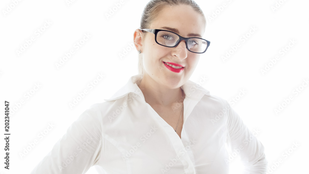 Portrait of young smiling businesswoman looking in camera