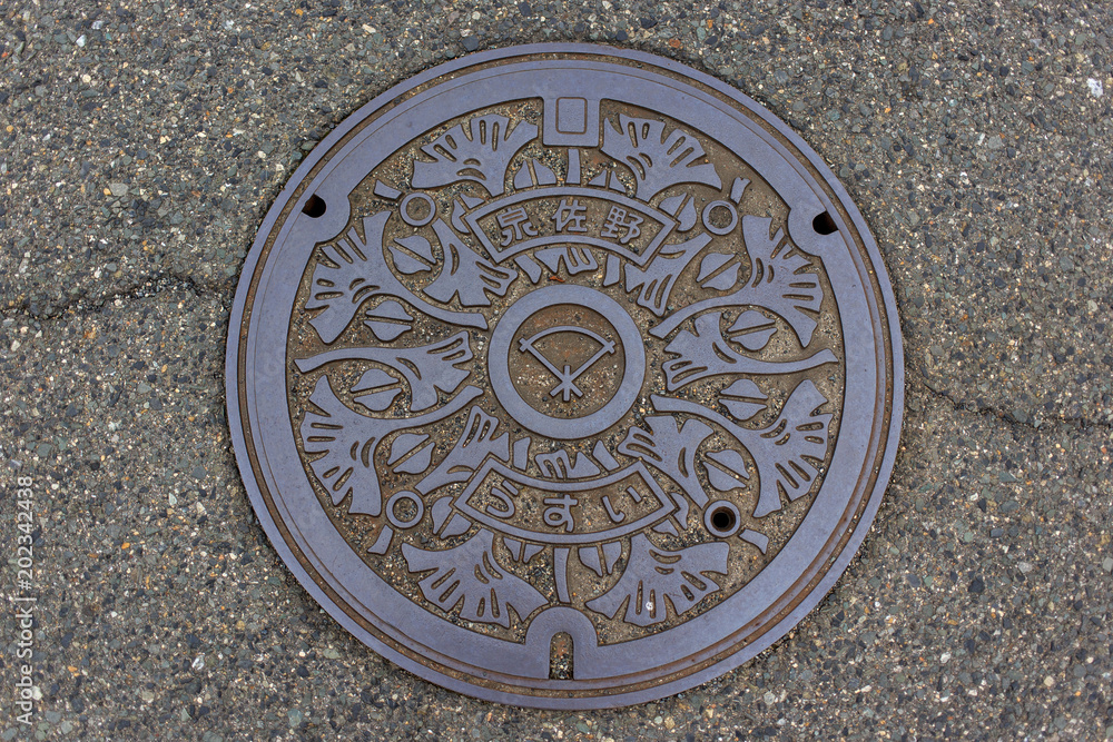 Manhole cover with unique design from Kumatori, Japan