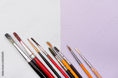 school supplies on colorful backgrounds