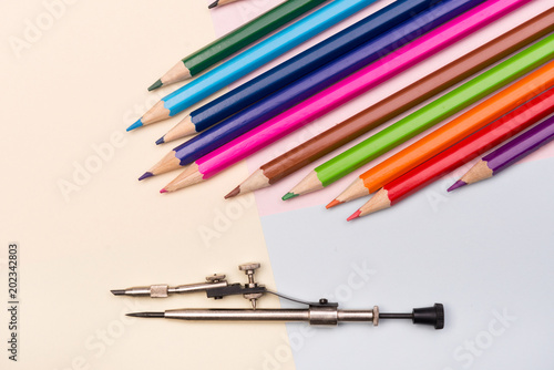 school supplies on colorful backgrounds