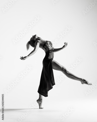 Young beautiful ballerina is posing in studio © Alexander Y