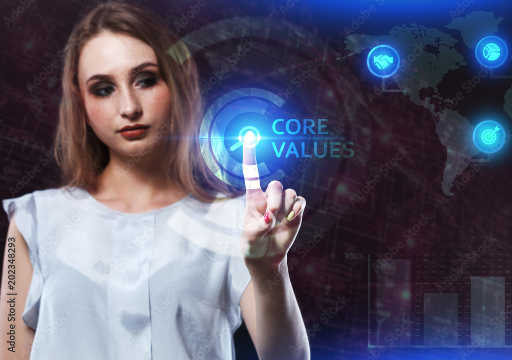 The concept of business, technology, the Internet and the network. A young entrepreneur working on a virtual screen of the future and sees the inscription: Core values The concept of business, technology, the Internet and the network. A young entrepreneur working on a virtual screen of the future and sees the inscription: Core values