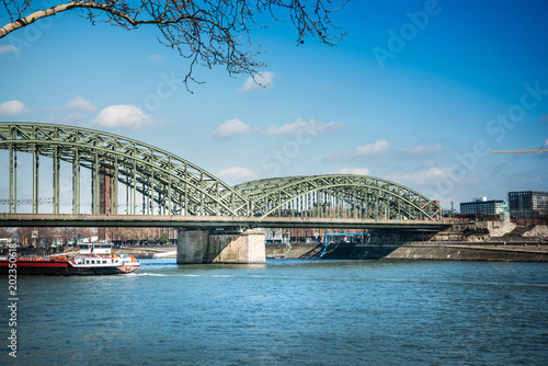 Hohenzollern Bridge, is a bridge crossing the river Rhine in the German city of Cologne