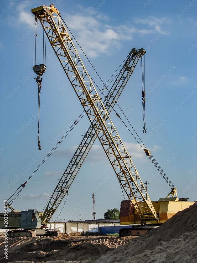 Construction machinery on the construction site summer day