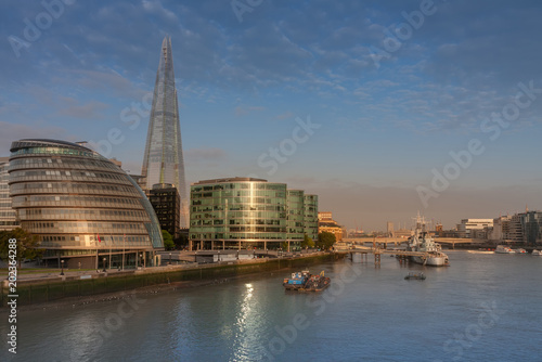 Buildings on the south bank of the river Thames in London in the morning.