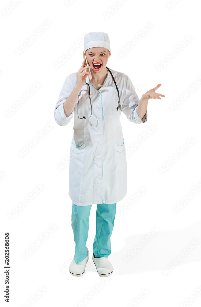 Beautiful young woman in white coat posing at studio. Full length studio shot isolated on white. Beautiful young woman in white coat posing at studio. Full length studio shot isolated on white.