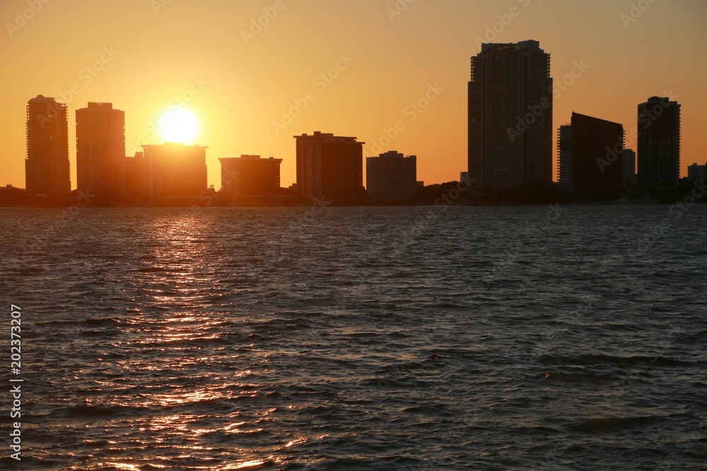 City of Miami Skyline Near Sunset in Key Biscayne Next to the Rickenbacher Causeway with Atlantic Ocean Below