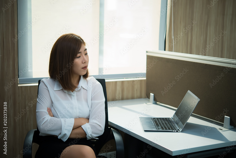 Beautiful asian woman working in a office,Thailand people,Business woman work at company Beautiful asian woman working in a office,Thailand people,Business woman work at company