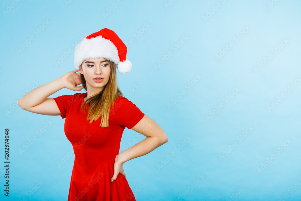 Woman wearing Santa Claus helper costume Woman wearing Santa Claus helper costume