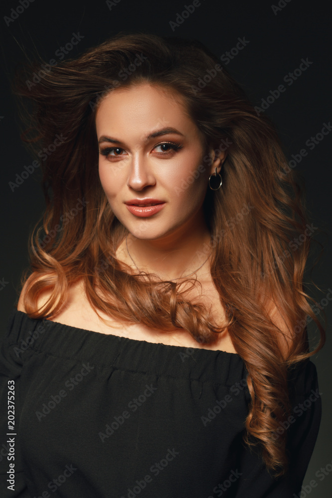 Stylish beauty portrait of a fashionable girl with makeup and hair Stylish beauty portrait of a fashionable girl with makeup and hair