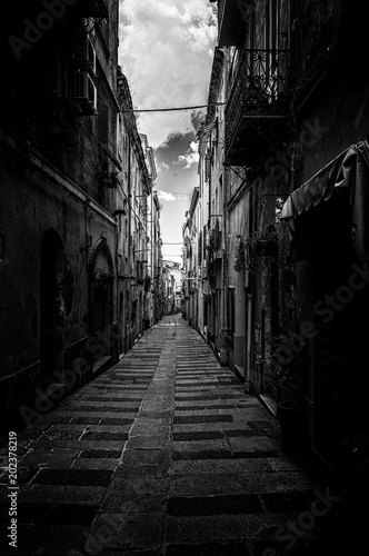 Dark alley in sardinian old town