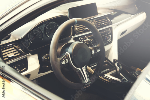 white modern model car steering wheel