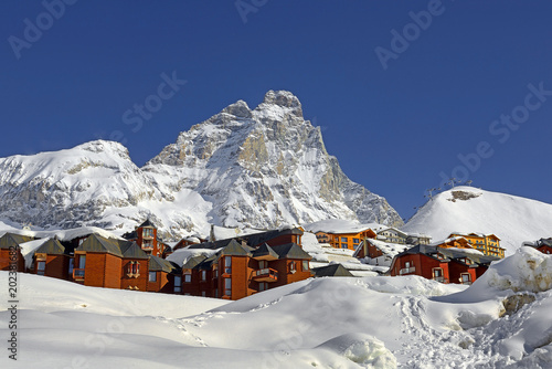 Matterhorn peak - Monte Cervino, Italy. Mountain situated on the border between Switzerland and Italy, over the Swiss Zermatt and the Italian town of Breuil-Cervinia photo