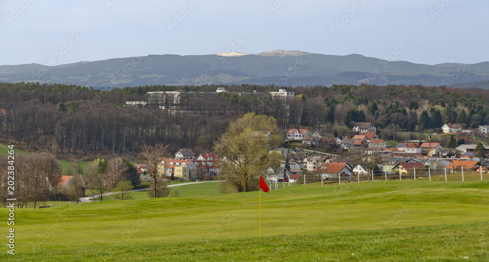 spring landscape with a golf course