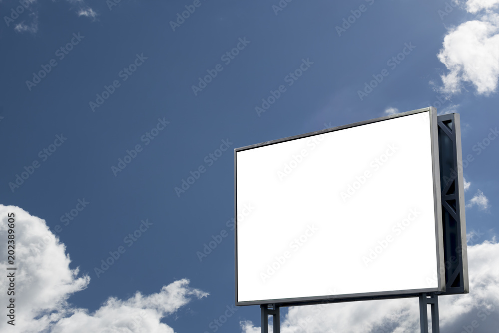 Billboard with white space Blue sky and clouds on background Billboard with white space Blue sky and clouds on background