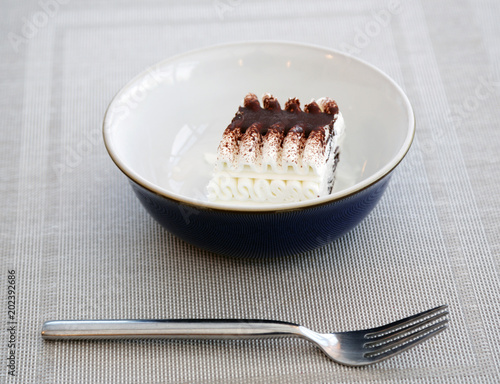 Viennetta ice cream in a dish with fork