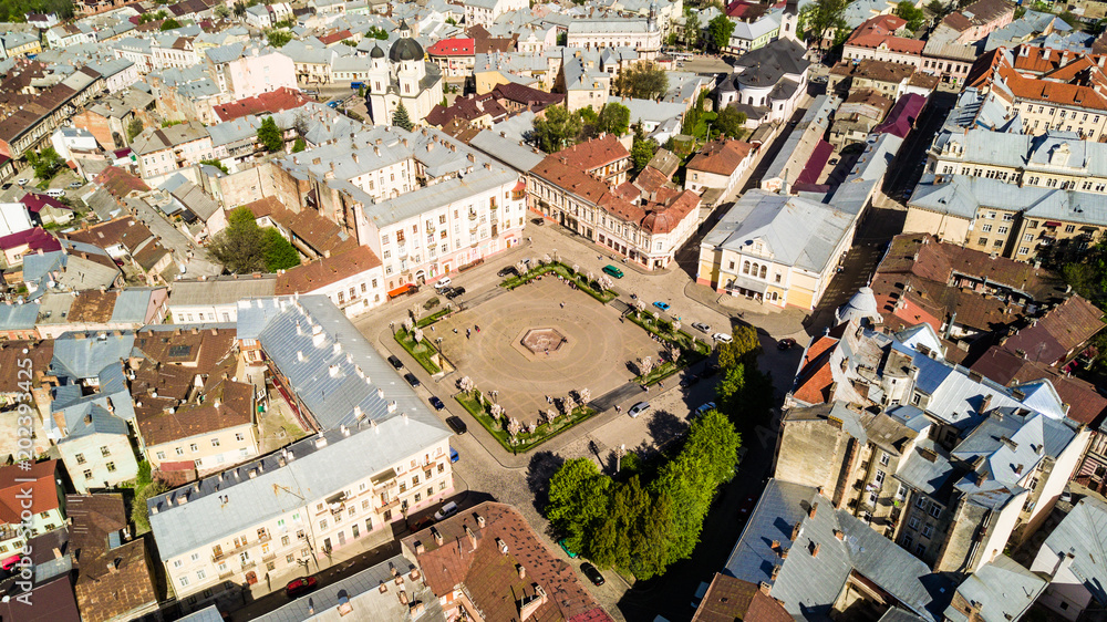 CHERNIVTSI, UKRAINE - April , 2018 : Filarmonic square, Chernivtsi city from above Western Ukraine. Sunny day of the city.