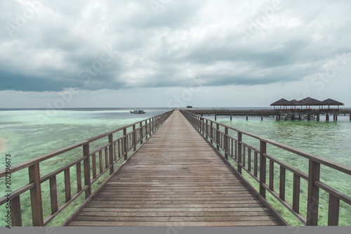 Wooden Pier at Tropical Beach