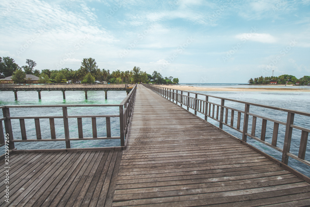 Wooden Pier at Tropical Beach