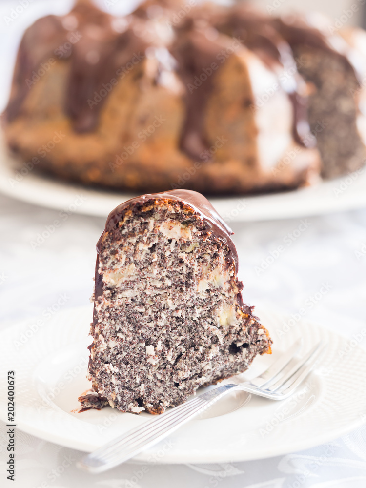 Flourless gluten and sugar free Easter gugelhupf cake with banana, poppy seeds and chocolate icing