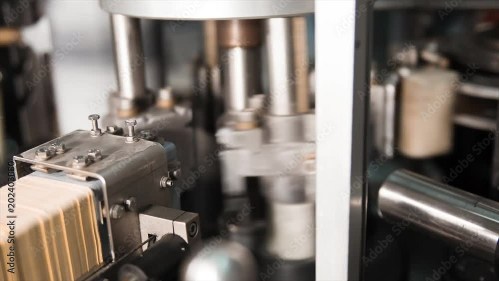 Automatic Process Of Gluing Labels On Glass Bottles Industrial automatic-process-of-gluing-labels-on-glass-bottles-industrial