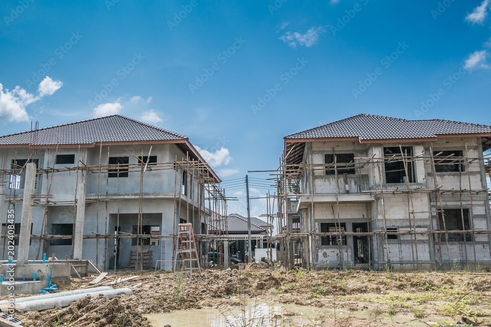 construction residential new house in progress at building site construction residential new house in progress at building site