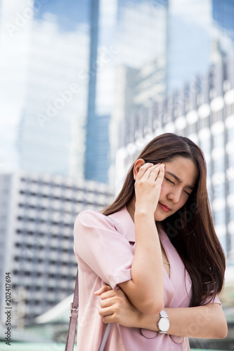 Young asian business woman outdoors