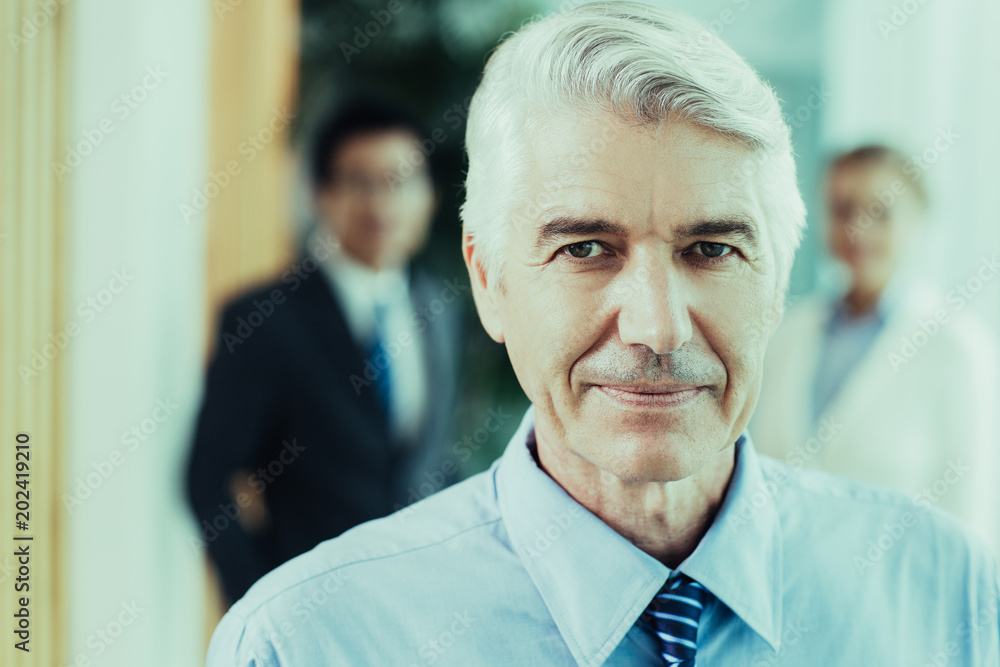 Φωτογραφία Close-up portrait of confident senior Caucasian businessman wearing shirt and ti