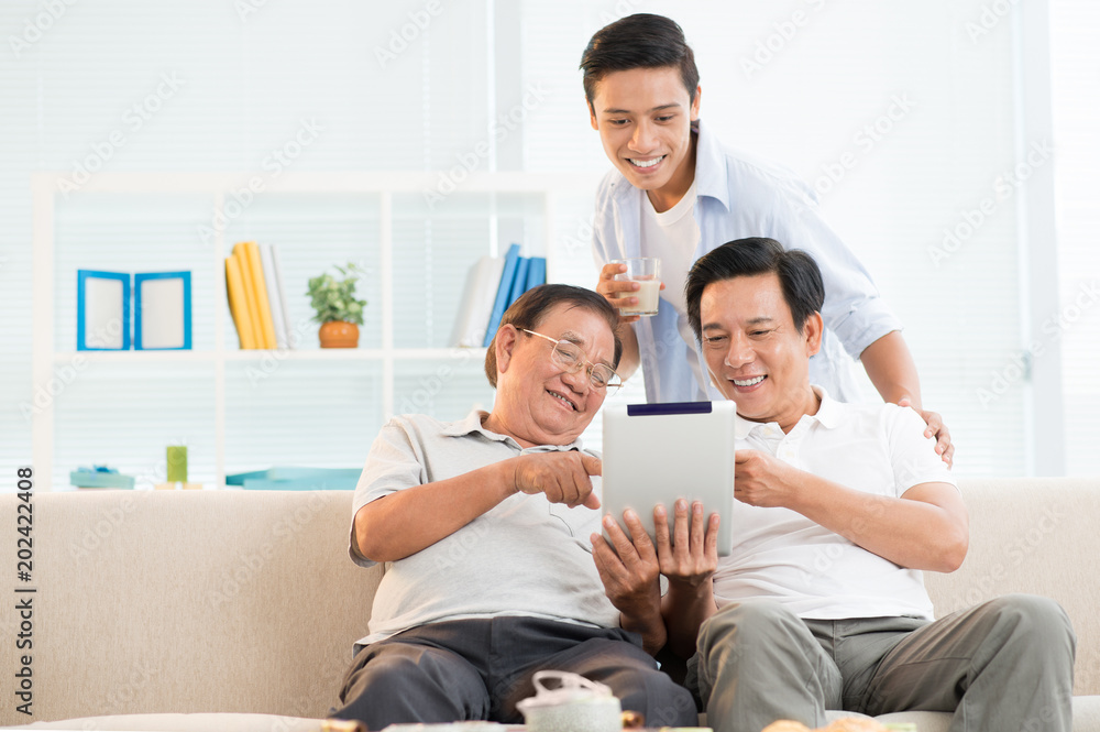 Family with digital tablet Family with digital tablet