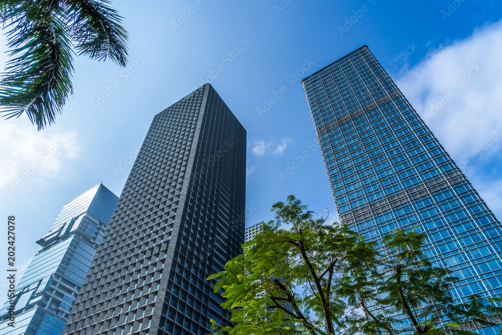 low angle view of skyscrapers in city of China. low angle view of skyscrapers in city of China.