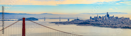 Panorama of the Golden Gate bridge with San Francisco skyline in the background photo