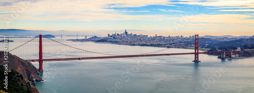 Panorama of the Golden Gate bridge with San Francisco skyline in the background