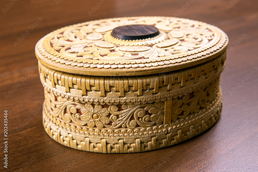 Casket from birch bark on a table Casket from birch bark on a table
