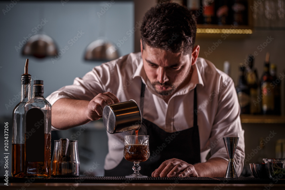 Barman pouring coffee Barman pouring coffee