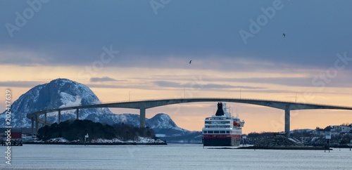 Coastal liner departure from Brønnøysund port in Northern Norway photo