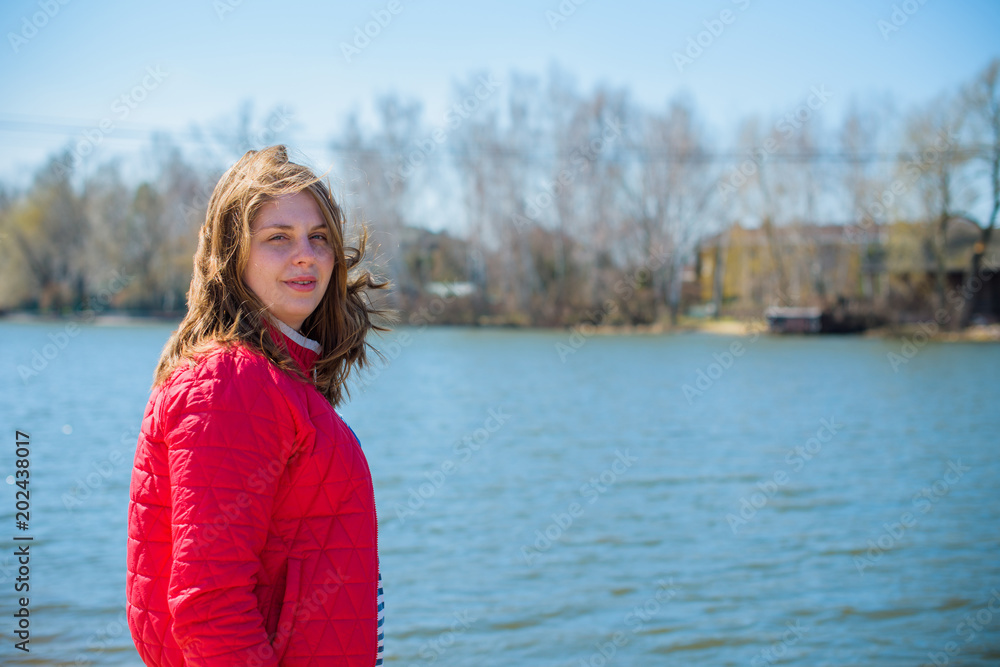 Young american woman with xl figure, plus size model, life of young woman. Plump Lady resting in park. Concept of overweight Young american woman with xl figure, plus size model, life of young woman. Plump Lady resting in park. Concept of overweight