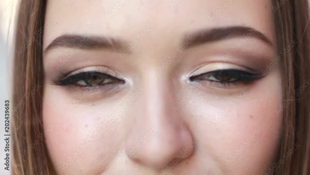 Close-up portrait of beautiful caucasian smiling woman Close-up portrait of beautiful caucasian smiling woman